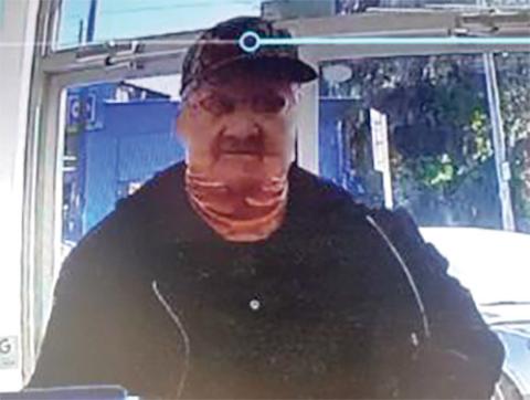 An armed man, wearing a mask, robbed the North Florida Pharmacy’s Fort White location Thursday. (COURTESY)