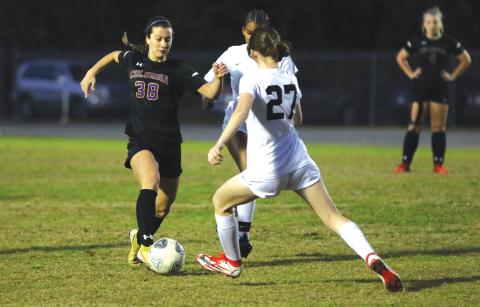 Columbia forward Skyler Ziegaus dribbles up the field against Leon during Wednesday’s District 2-6A quarterfinal. (MORGAM MCMULLEN/Lake City Reporter)