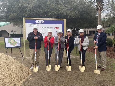 Keith Couey, Dana Brady-Giddens, Narrie Smith, Stephanie Johns, Keith Hudson and Lex Carswell break ground Tuesday afternoon at the site of Fort White High School’s new auditorium building. (COURTESY)