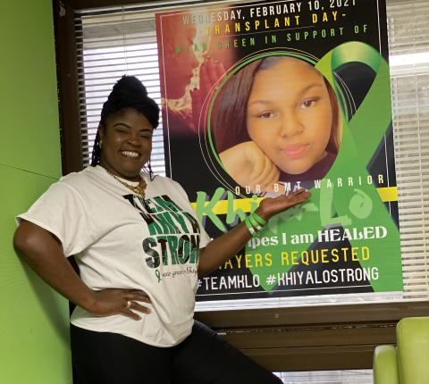LaKesia Hendon shows off a poster of MiKhiya Hendon in her hospital room at Shands. (COURTESY)