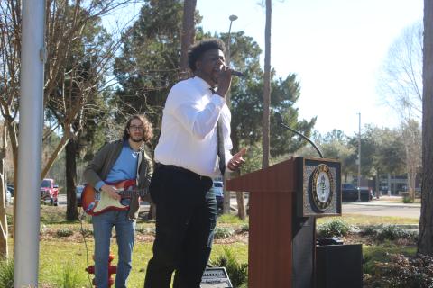 Kipp Walker (right) sings Marvin Gaye’s ‘What’s Going On’ while accompanied by Todd Siff on the electric guitar at Florida Gateway College on Tuesday morning. The two performed at the FGC Black History Month kickoff ceremony. (TONY BRITT/Lake City Reporter)