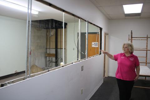Tomi Brown, Columbia County’s supervisor of elections, looks over construction work for the addition of a 35-foot window that will allow voters to see into the canvassing room. (TONY BRITT/Lake City Reporter)