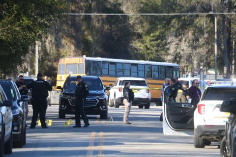 Law enforcement investigates a shooting incident on SW Winter Way near Lake City Middle School on Feb. 14. (FILE)