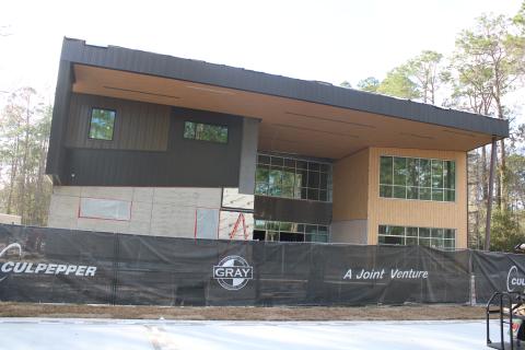 Construction workers continue working on the new STEM building on the Florida Gateway College campus Wednesday afternoon. The $12.8 million project is scheduled to be substantially complete by mid-April with hopes of opening in June. (TONY BRITT/Lake City Reporter)