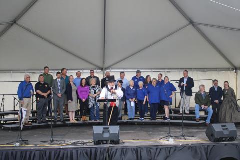 Tony Buzzella (center), commanding general of the Blue-Grey Army, starts off the Olustee Festival with some opening remarks Friday. (TONY BRITT/Lake City Reporter)