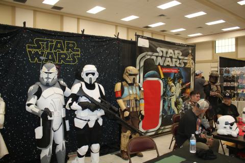 Dave Tischhauser (left) and David Burks (middle) pose in their Star Wars cosplay Saturday afternoon. (TONY BRITT/Lake City Reporter)