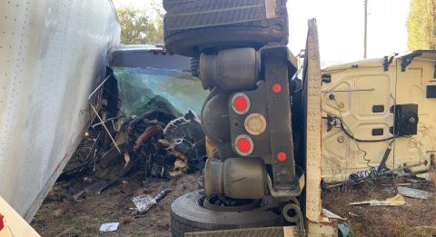 A crash Friday morning involving a passenger bus and tractor trailer on State Road 51 near Mayo sent 13 people to the hospital. (COURTESY)
