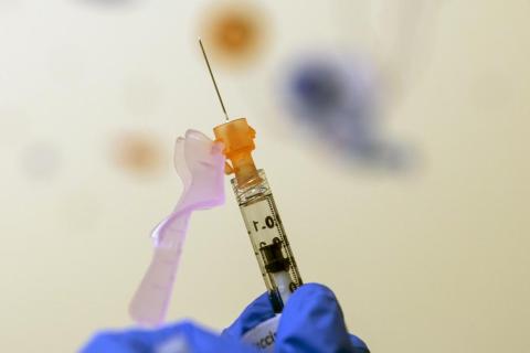 Nurse Lydia Holly prepares a child's covid-19 vaccine dose on Nov. 3, 2021, at Children's National Hospital in Washington. (AP File)