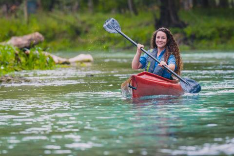 A woman enjoys the natural resources of North Florida while kayaking. The Suwannee River Water Management District is launching a “Dive In” initiative to help protect the springs and water quality in North Florida. (COURTESY)