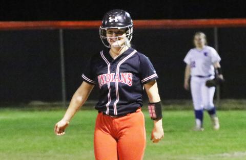 Fort White catcher Kaitlyn Suggs smiles at first base after hitting a single against Taylor County on Tuesday. (JORDAN KROEGER/Lake City Reporter)