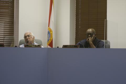 Mayor Stephen Witt (left) and Lake City Councilman Jake Hill listen during Wednesday’s interviews. (JAMIE WACHTER/Lake City Reporter)