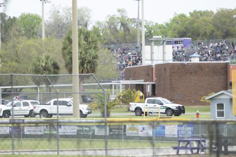 A Columbia County Sheriff’s Office vehicle sits parked near Tiger Stadium, where students waited on buses to safely evacuate Columbia High School. Law enforcement officials found no explosive devices on the scene. (JAMIE WACHTER/Lake City Reporter)