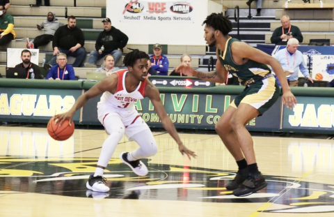Allen guard Brandon Lawrence is defended by FGC guard Antonio Card during Wednesday’s consolation bracket game in the NJCAA Division II tournament at Danville Area Community College’s Mary Miller Complex in Danville, Ill. (COURTESY)