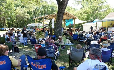 Local songwriters, musicians and music enthusiasts gather during a previous Santa Fe River Song Contest. (COURTESY)