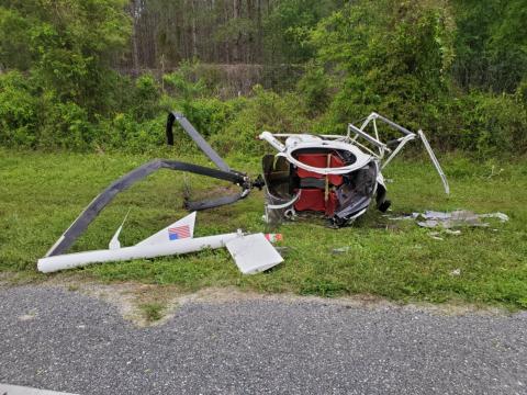 A small helicopter crashed alongside State Road 47 in southern Columbia County on Saturday. The two occupants suffered minor injuries. (COURTESY)