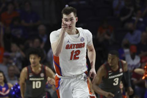 Florida forward Colin Castleton celebrates after making a shot against Arkansas on Feb. 22 in Gainesville. (MATT STAMEY/Associated Press)