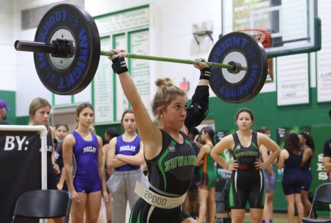 Suwannee’s Matti Marsee performs the clean and jerk during the District 4-1A meet on Jan. 21. (PAUL BUCHANAN/Special to the Reporter)