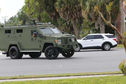 The Columbia County Sheriff’s Office SWAT vehicle pulls out on East Duval Street following a brief standoff Tuesday morning that ended peacefully. (JAMIE WACHTER/Lake City Reporter)