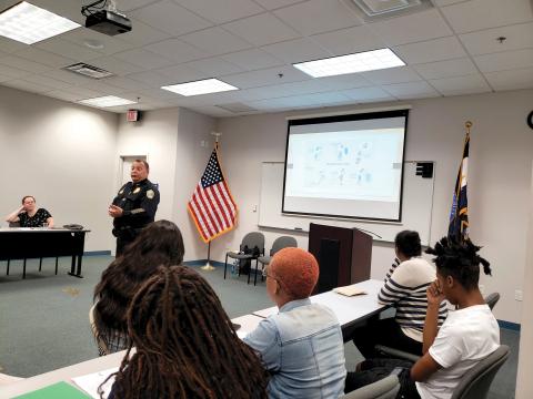 Lake City Police Chief Gerald Butler talks with teens about interviewing during the police department’s Sumer Youth Employment Program in 2019. (COURTESY)