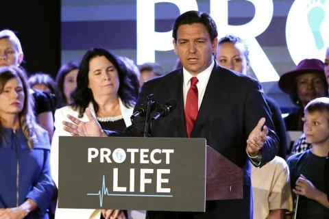 Florida Gov. Ron DeSantis speaks to supporters before signing a 15-week abortion ban into law Thursday in Kissimmee. The move comes amid a growing conservative push to restrict abortion ahead of a U.S. Supreme Court decision that could limit access to the procedure nationwide. (JOHN RAOUX/Associated Press)