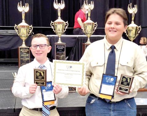 Fort White Middle School students Cyler Robinson (left) and Jonaz Watson earned statewide recognition for their science project at the 67th State Science and Engineering Fair of Florida last week in Lakeland. (COURTESY)