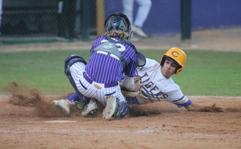 Columbia’s Grant Bowers is tagged out at home by Union County Blake Agner in the second inning on Friday. (JORDAN KROEGER/Lake City Reporter)