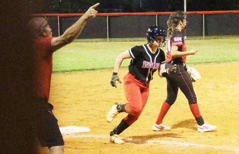 Fort White’s Hannah LeBleu turns off of third base toward home plate to score a run against Hamilton County on Thursday. (MORGAN MCMULLEN/Lake City Reporter)