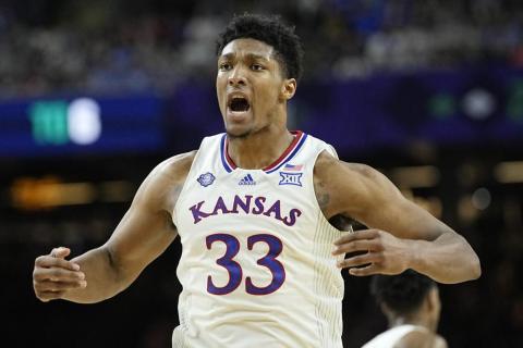 Kansas forward David McCormack celebrates after scoring against Villanova in Final Four on Saturday in New Orleans. (DAVID  J. PHILLIP/Associated Press)