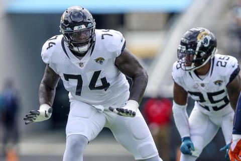 Jacksonville Jaguars offensive tackle Cam Robinson in action during a game against the Denver Broncos on Sept. 19, 2021, in Jacksonville. Robinson signed his franchise tender with the Jaguars on Wednesday, guaranteeing him $16.7 million this season. (AP File)