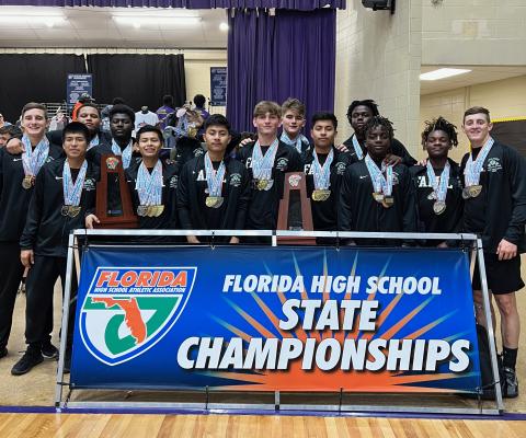 Suwannee lifters pose for a photo with their medals and state championship  trophies Friday afternoon at the Class 2A state championship meet. (COURTESY)
