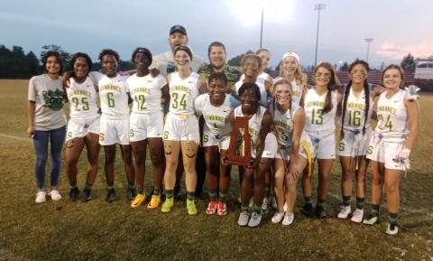 Suwannee’s flag football team celebrates with the District 2-1A trophy after defeating Florida High on Friday night. (CONCEPCION LEDEZMA/Special to the Reporter)