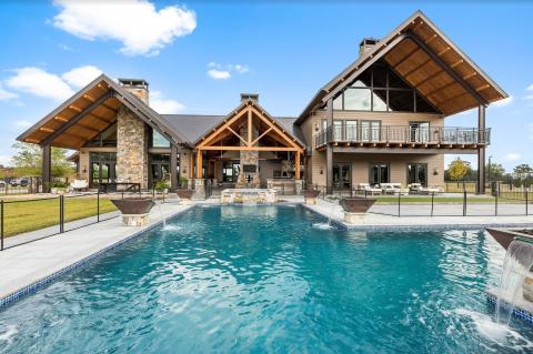 The swimming pool at the Double Barrel Ranch shimmers in the afternoon light. The ranch, located on SW Mandiba Drive, sold for $4.25M in January. (COURTESY)