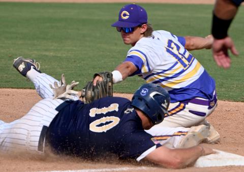 Eau Gallie's Brandon Braggs slides safely into third base before Columbia's Ty Jackson can apply the tag during Thursday's Class 5A state semifinal at Hammond Stadium in Fort Myers. (CHRIS TILLEY/Special to the Reporter)