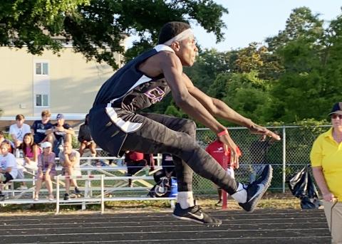 Columbia’s Seth Stockton won the Region 1-3A title in the triple jump on Friday, breaking his own school record with a leap of 14.50m. (DYLAN ASPENWELL/Special to the Reporter)