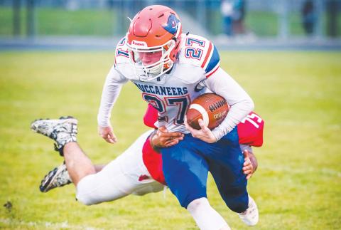 Branford receiver Brice Criggall escapes a tackle during last season’s game against Williston. (FILE)