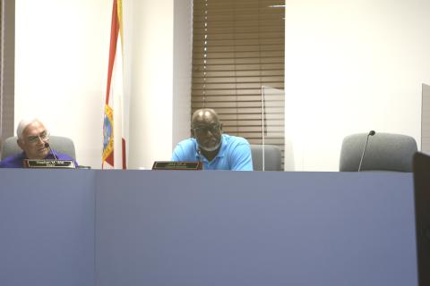 Councilman Jake Hill Jr. (right) speaks during a meeting in late April as Mayor Stephen Witt listens. (FILE)