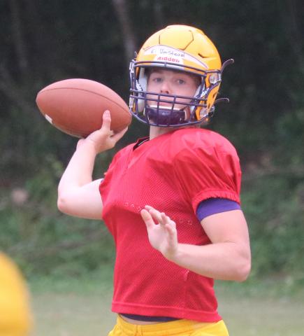 Columbia quarterback Evan Umstead throws a pass during Friday’s practice. (JORDAN KROEGER/Lake City Reporter)