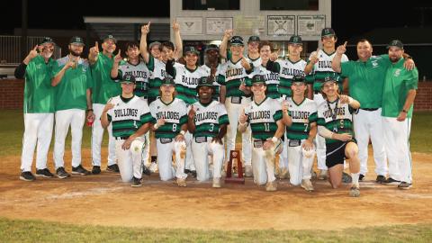 Suwannee's baseball team poses with the Region 1-4A championship trophy after defeating Bishop Kenny on Tuesday night. (PAUL BUCHANAN/Special to the Reporter)