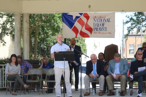 Matt Glover, New Life Christian Fellowship pastor, prays during the National Day of Prayer event Thursday. (TONY BRITT/Lake City Reporter)