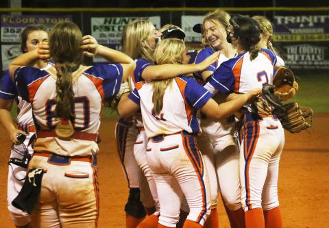 Branford’s softball team celebrates after defeating top-seeded Bell in the District 6-1A semifinals on Tuesday. (MORGAN MCMULLEN/Lake City Reporter)