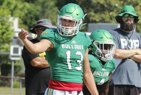 Suwannee quarterback Bronsen Tillotson signals to a teammate during Wednesday’s practice. (JAMIE WACHTER/Lake City Reporter)