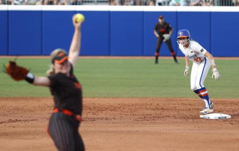 Florida's Kendra Falby watches Oklahoma State's Kelly Maxwell pitches during Saturday’s Women's College World Series game in Oklahoma City. (ALONZO ADAMS/Associated Press)