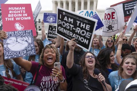 Demonstrators gather outside the Supreme Court in Washington, Friday, June 24, 2022. The Supreme Court has ended constitutional protections for abortion that had been in place nearly 50 years, a decision by its conservative majority to overturn the court's landmark abortion cases. (JOSE LUIS MAGANA/Associated Press)