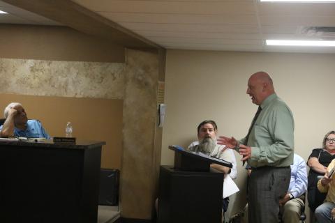 Florida Gateway College President Lawrence Barrett addresses the Lake Shore Hospital Authority during its Thursday meeting. (MORGAN MCMULLEN/Lake City Reporter)