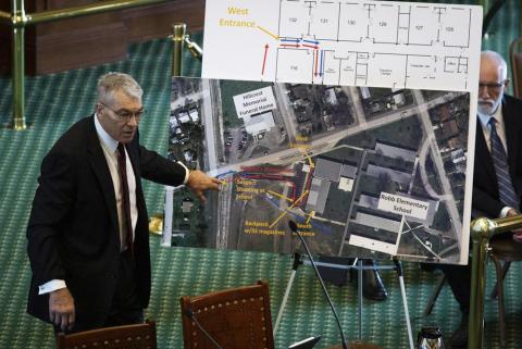 Texas Department of Public Safety Director Steve McCraw uses maps and graphics to present a timeline of the school shooting at Robb Elementary School in Uvalde, during a hearing Tuesday in Austin, Texas. Two teachers and 19 students were killed. (SARA DIGGINS/Austin American-Statesman via AP)