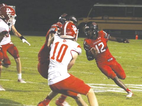 Fort White receiver Najeeb Smith makes a cut during a game against Dixie County on Oct. 15, 2021, at Arrowhead Stadium. (FILE)