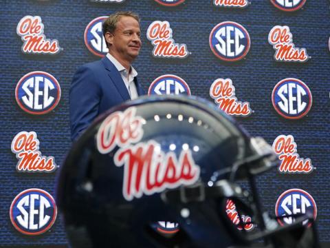 Mississippi head coach Lane Kiffin walks to the podium before speaking during SEC Media Days on Monday in Atlanta. (JOHN BAZEMORE/Associated Press)