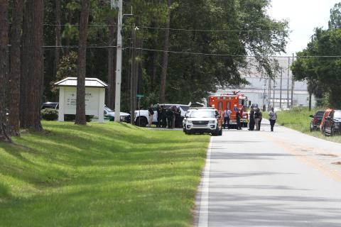 Law enforcement and first responders gathered on the Florida Gateway College campus Thursday when a bomb threat was called in against buildings on the college for the second straight day. (STAFF)