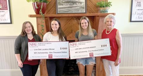 Suwannee High graduates Teresa Williams (second from left) and Madison Ramsey (second from right) were awarded scholarships from the NFC Foundation after an open house event at North Florida College’s Live Oak Learning Center. Williams was drawn as the $1,000 scholarship winner while Ramsey was selected for a $500 scholarship. Joining the two winners are NFC Foundation Scholarship Coordinator Annabelle Scott (left) and Myra Brock, NFC Foundation Board of Directors member. (COURTESY)
