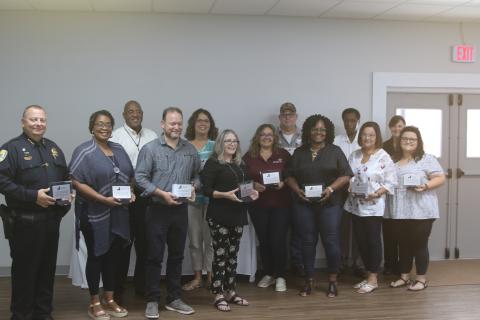 Employers involved with the CareerSource Florida Crown Summer Youth Employment Program pose with awards they received for participating in the program during the program’s banquet on Friday. (TONY BRITT/Lake City Reporter)